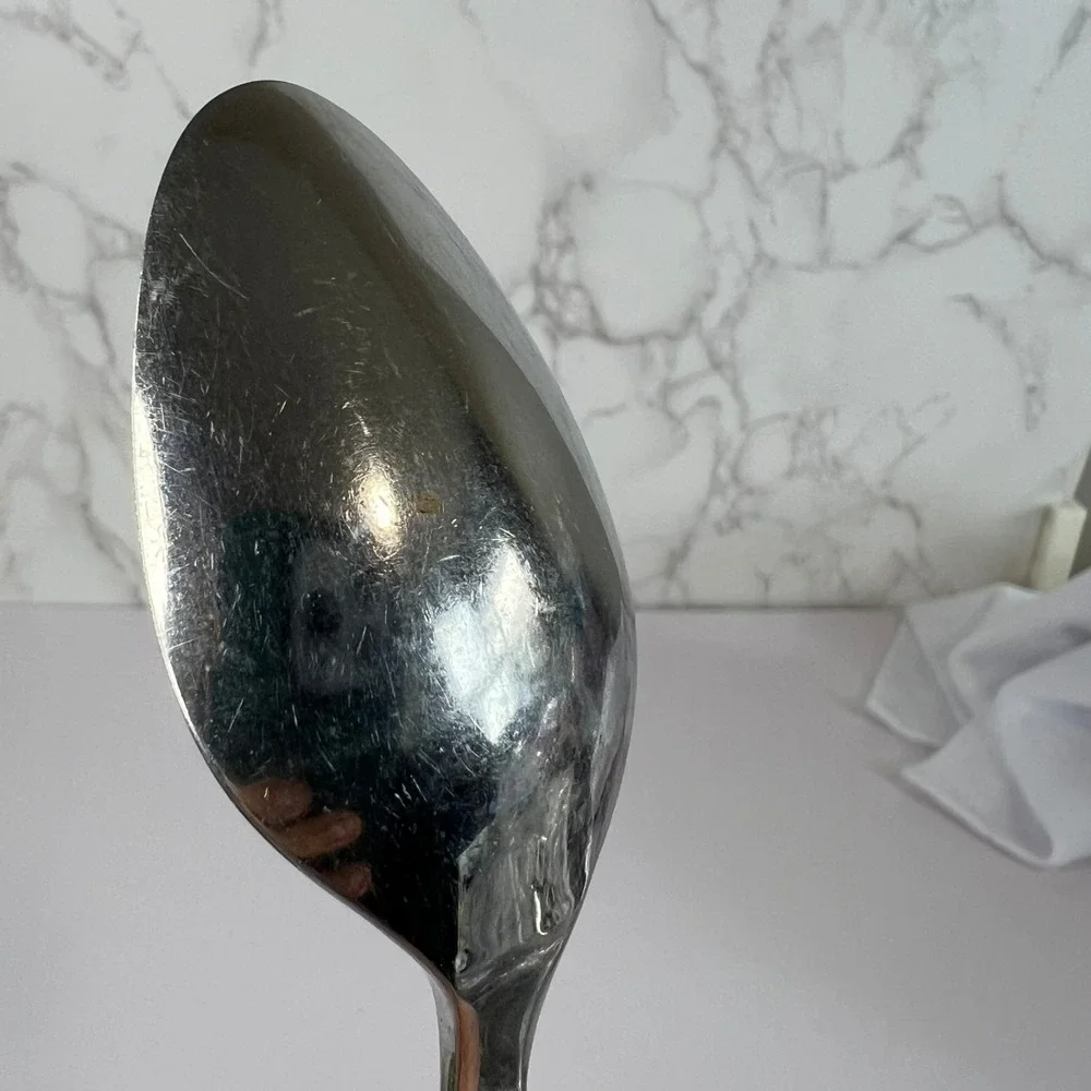Oneida Apollo 18/10 Stainless Steel Pierced Circles Glossy Dinner Spoon Flatware